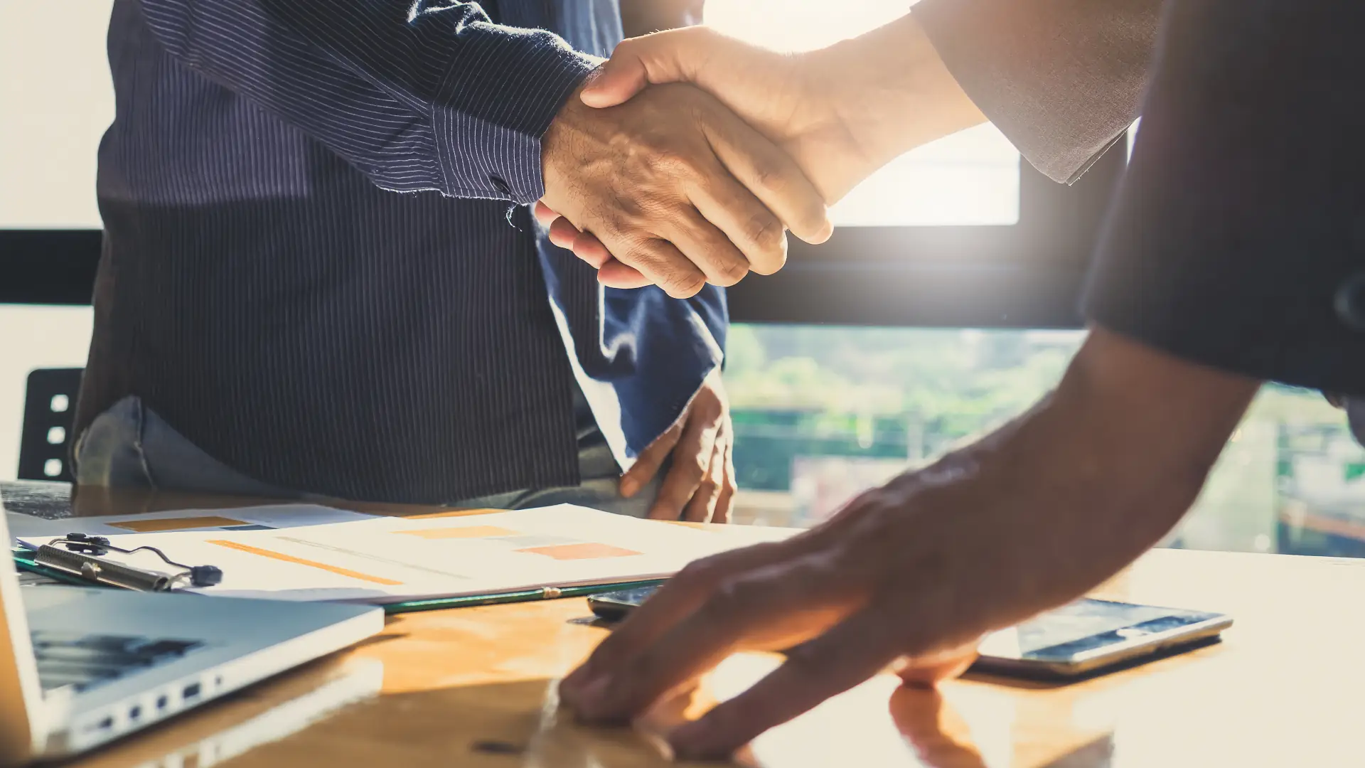 Resource consent applications – shaking hands to confirm new development