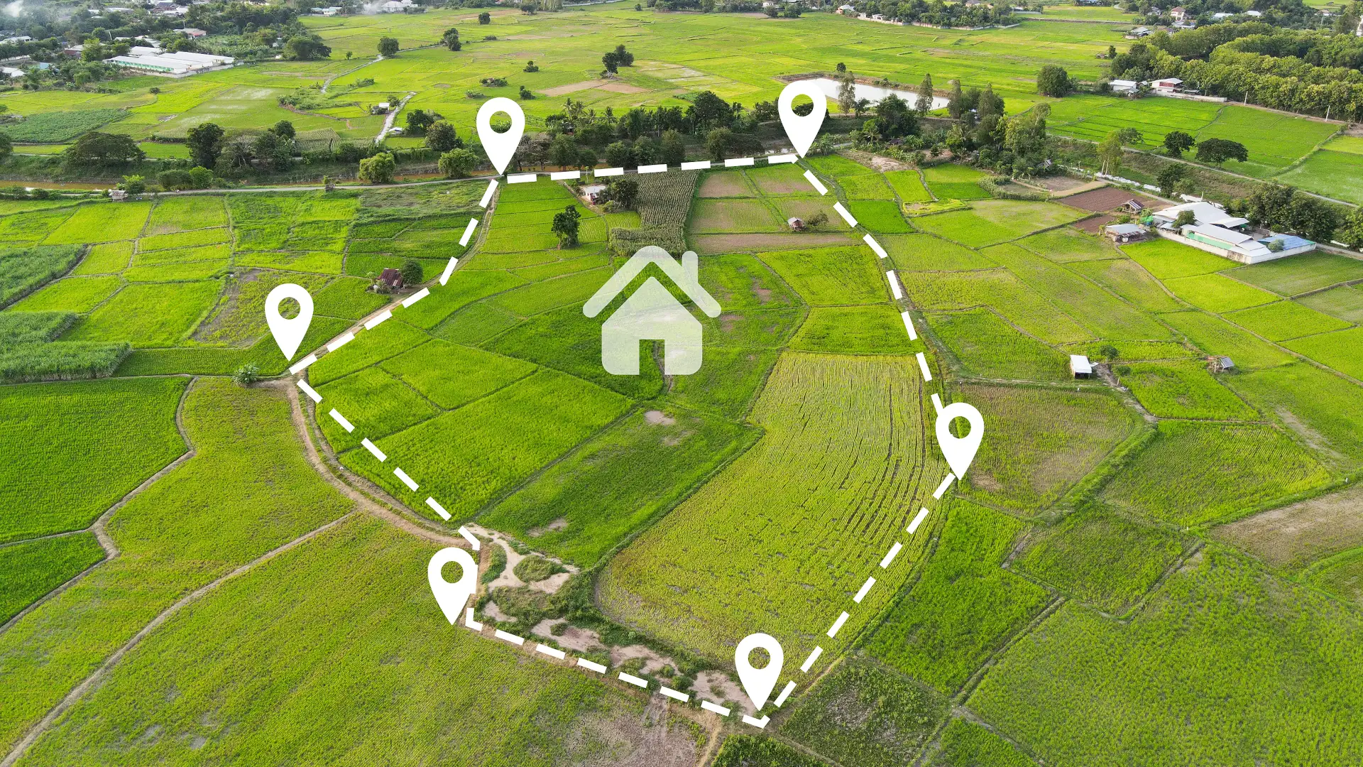 Aerial view showing property boundary lines over a rural property
